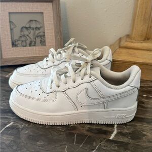 Nike shoes size 1Y needs new laces flaws shown